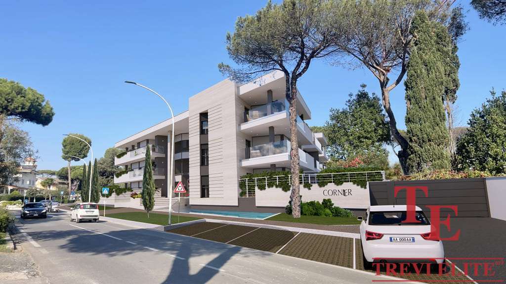 Современный жилой комплекс на солнечной улице с зелеными деревьями и просторными балконами, идеальное место для комфортной жизни в престижном районе.