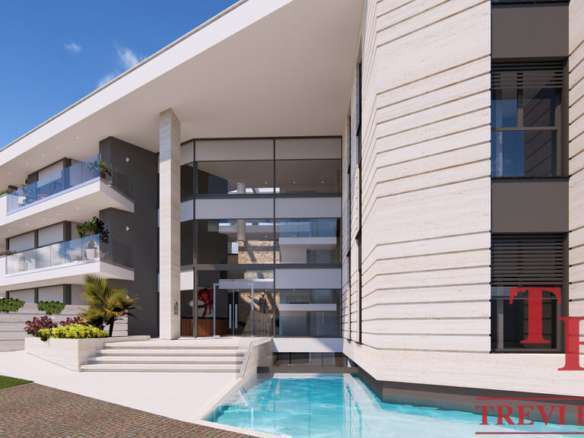 Современный элитный жилой комплекс с бассейном и просторными террасами, расположенный в престижном районе. Высокий стандарт комфорта и изящного дизайна для взыскательных клиентов.