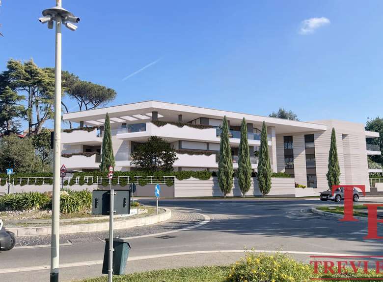 Современный элитный жилой комплекс с стильным дизайном и ухоженной территорией, идеально подходит для тех, кто ценит комфорт и роскошь в сердце города.