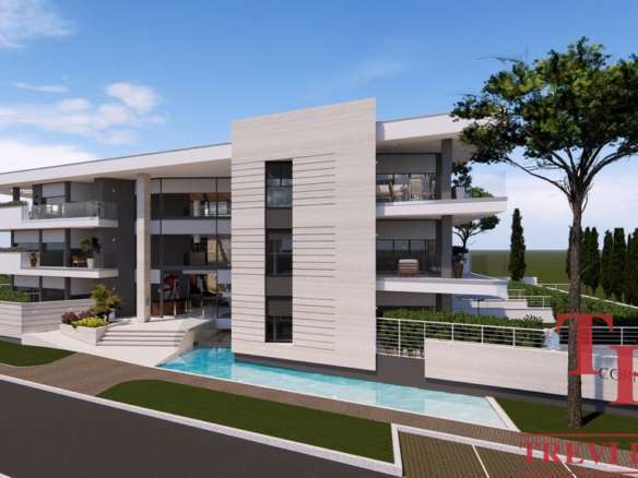 Элитная современная вилла с просторными террасами и бассейном, окруженная зелеными насаждениями, идеально подходит для роскошной жизни и инвестиций в международную недвижимость.