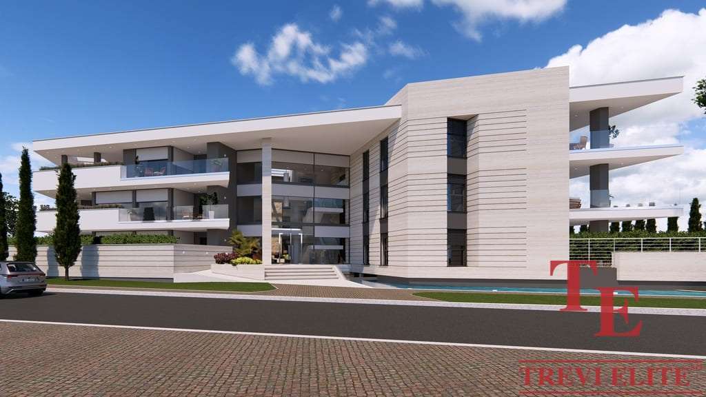 Высококлассное жилое здание современного дизайна, окруженное зеленью и дорожной инфраструктурой, представляет элитную недвижимость в Италии и по всему миру от агентства Треви Элит.