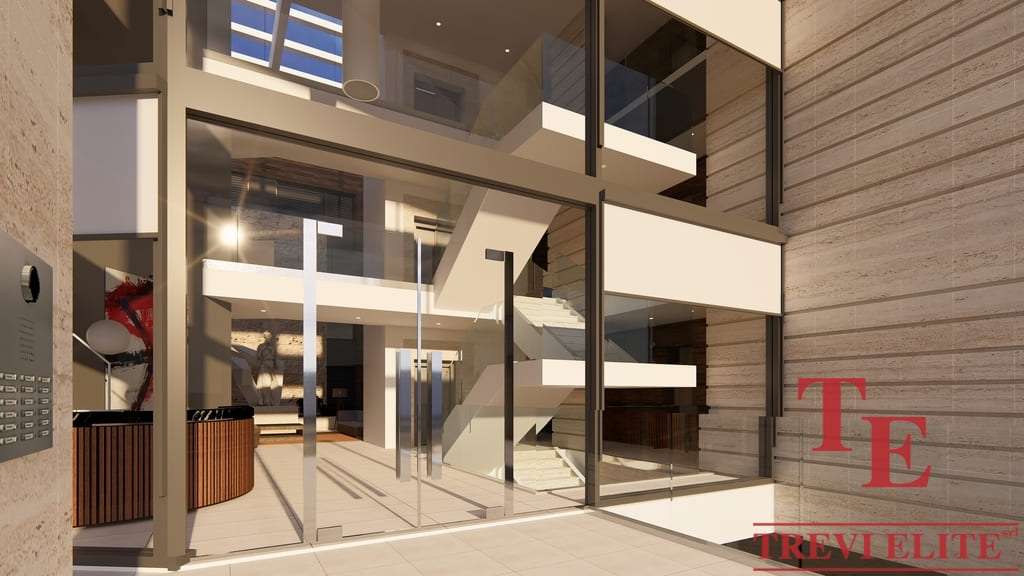 Просторный современный интерьер элитного жилого комплекса с панорамными окнами и стильным дизайном, идеально подходящий для роскошной жизни.