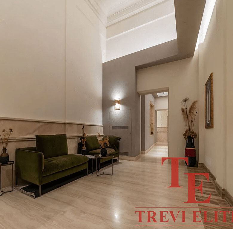 Элегантная гостиная в роскошном элитном жилом комплексе с современным дизайном и качественной отделкой, подчеркивающей высокий статус и комфорт проживания.