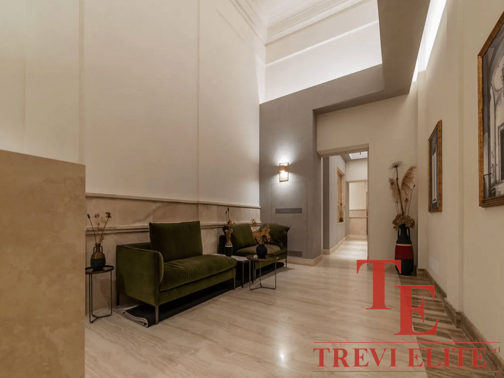 Элегантная гостиная в роскошном элитном жилом комплексе с современным дизайном и качественной отделкой, подчеркивающей высокий статус и комфорт проживания.