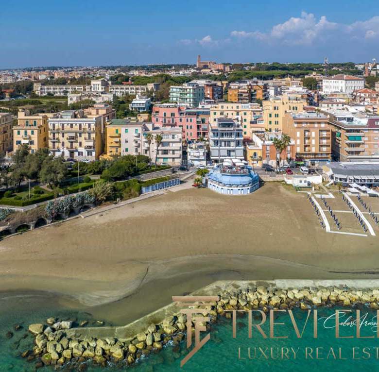 Элитные морские апартаменты на берегу моря в престижном районе. Высококлассные виды, современный дизайн, удобное расположение для роскошной жизни на побережье Италии.