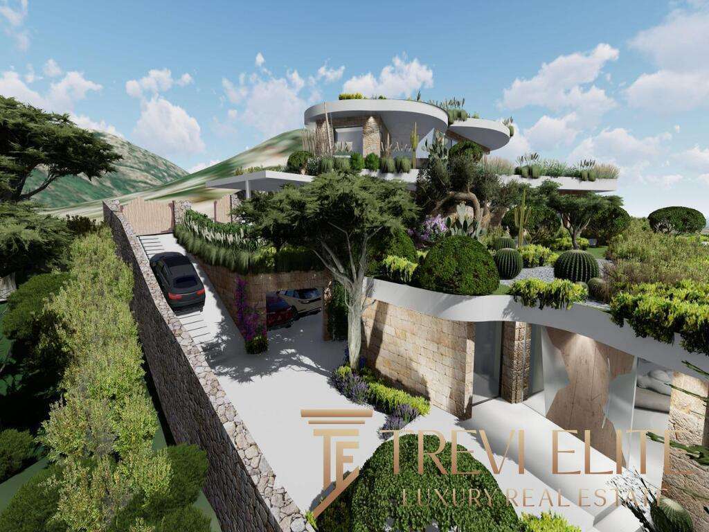 Изысканный современный особняк с террасами и пестрым ландшафтом, расположен на холме с живописным видом на природу и горы, оснащён автостоянкой и просторными зонами для отдыха и развлечений.