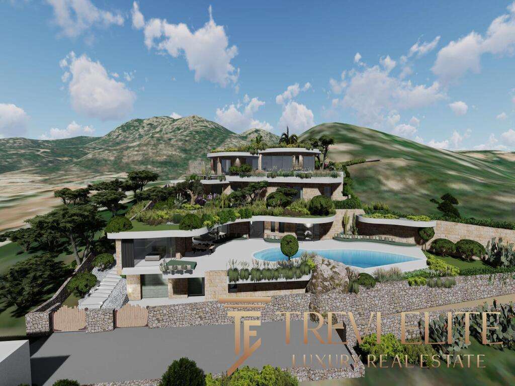 Элитная вилла на холме с бассейном и террасами, окруженная зеленой природой и горным пейзажем, эксклюзивная недвижимость в Италии от агентства Треви Элит.