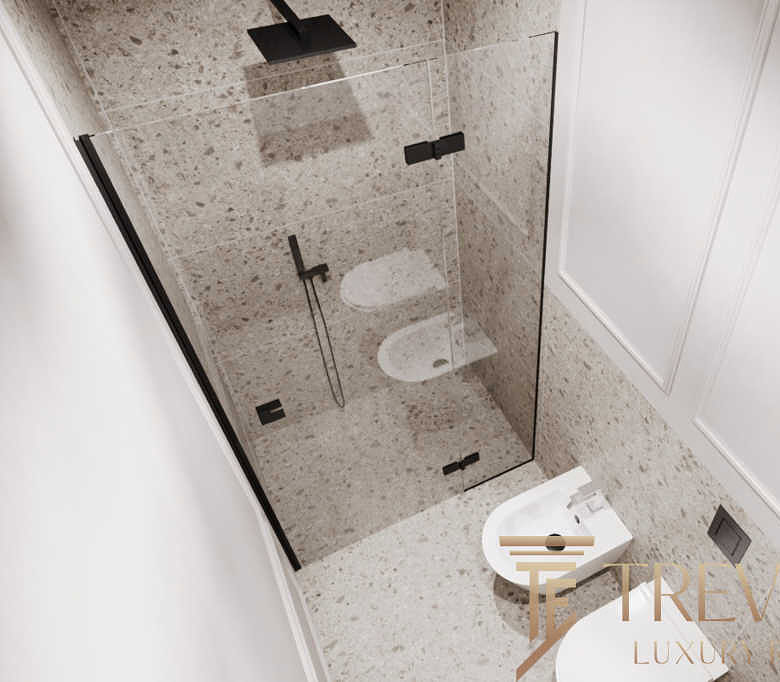 Современная ванная комната с душевой кабиной и туалетом в элитной недвижимости. Элегантное оформление, высококачественные материалы, стильный дизайн для комфорта и уюта.