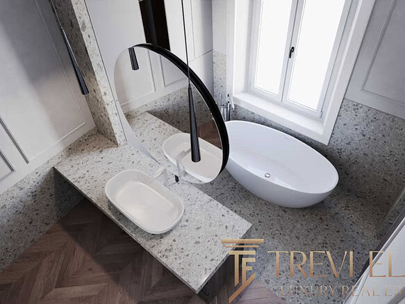 Роскошная ванная комната с современной ванной и гранитной отделкой на окне. Идеальное решение для стильного интерьера и комфорта в элитном жилье.