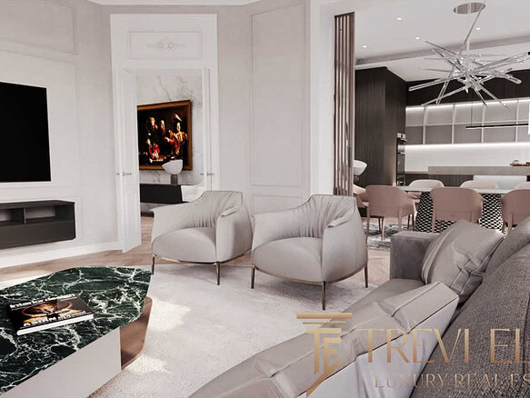 Роскошная гостиная с современным дизайном, мягкой мебелью и элегантным декором, создающая уютную атмосферу для отдыха и встреч.