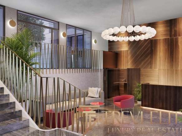 Элегантный интерьер лобби роскошного отеля или недвижимости, современный дизайн, теплые деревянные тона, уютные зоны отдыха и стильное освещение.