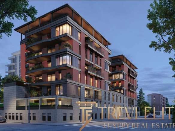 Высококлассный жилой комплекс с современным дизайном, панорамными окнами и просторными балконами, расположенный в престижном районе для элитной недвижимости.