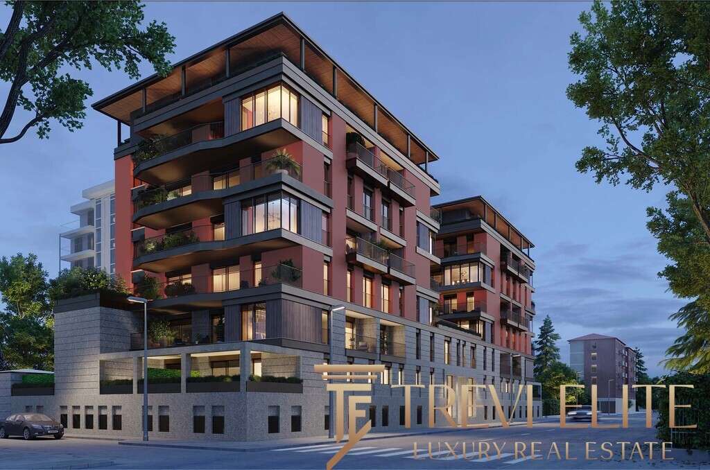 Высококлассный жилой комплекс с современным дизайном, панорамными окнами и просторными балконами, расположенный в престижном районе для элитной недвижимости.