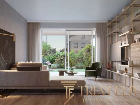 Элитная гостиная с панорамными окнами и видом на сад, современный дизайн интерьера, премиальная мебель, роскошные элементы декора.