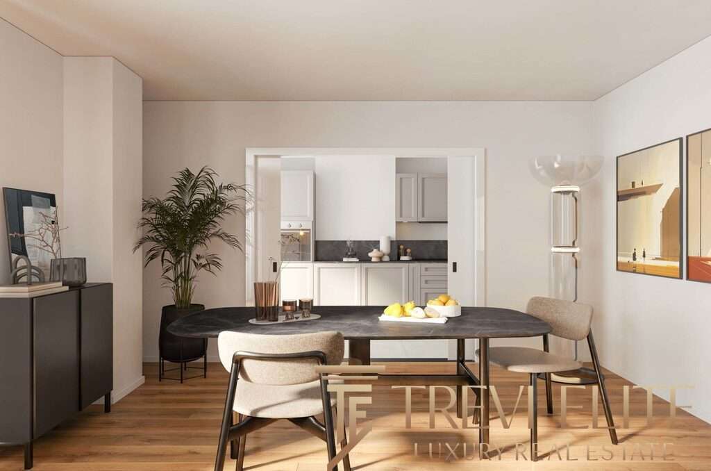 Элегантная современная гостиная с обеденной зоной, светлыми стенами, художественными фотографиями и минималистичным декором, идеально подходящая для роскошного жилья высокого класса.