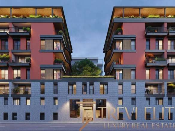 Современное элитное жилое здание с панорамными окнами и зелеными террасами, предназначенное для роскошной жизни и инвестиций, входящее в эксклюзивное портфолио агентства Треви Элит.