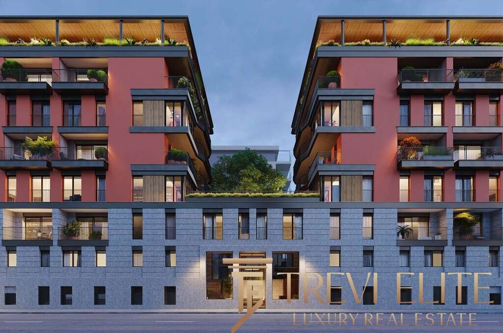 Современное элитное жилое здание с панорамными окнами и зелеными террасами, предназначенное для роскошной жизни и инвестиций, входящее в эксклюзивное портфолио агентства Треви Элит.